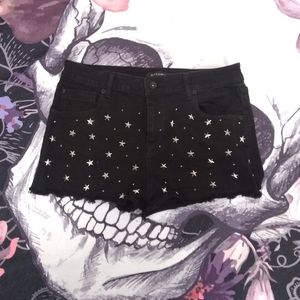 Black star stud shorts
